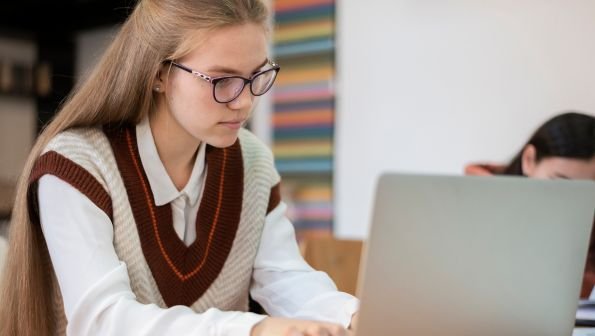 school wifi, slow school internet, girl on laptop