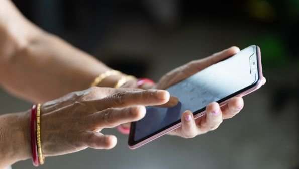 How to Transfer Data From One Phone to Another, woman on phone