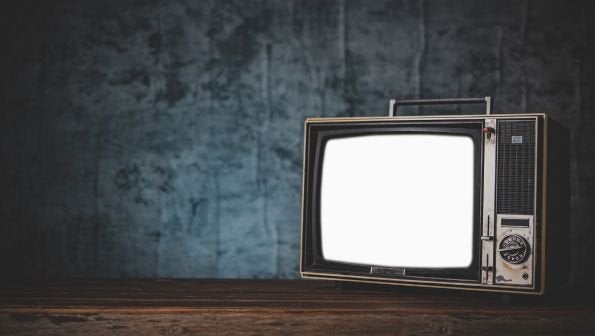 when was tv invented, who invented tv, image of box tv in dark room